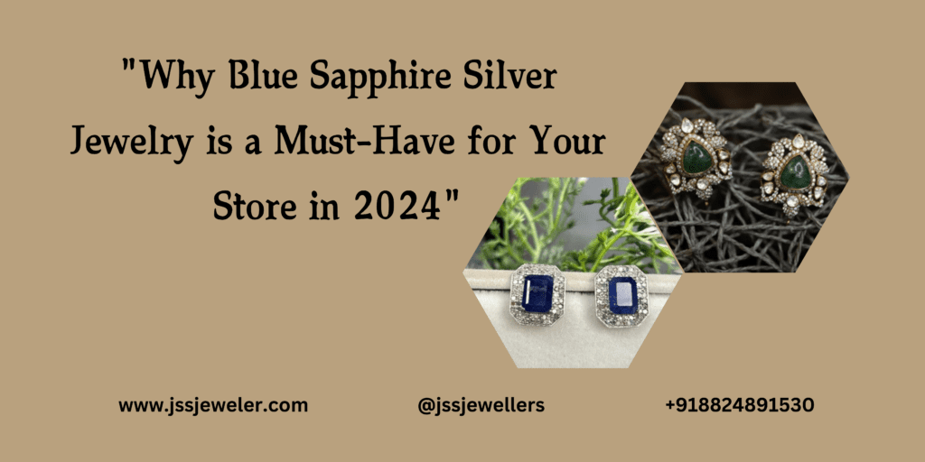 The image promotes blue sapphire silver jewelry as a must-have for stores in 2024. It features two pairs of earrings in different styles. The first pair has a teardrop shape with a blue sapphire stone and smaller diamonds surrounding it. The second pair has a rectangular blue sapphire stone with smaller diamonds on the side and a smaller diamond at the top. The earrings are placed on a textured surface with a green plant in the background.
