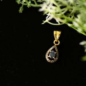 The image showcases a delicate and elegant pendant crafted from 925 sterling silver. The pendant features a central diamond, possibly a single stone or a cluster, set within a graceful design. The 925 hallmark, indicating sterling silver purity, is likely visible somewhere on the pendant or its accompanying chain.