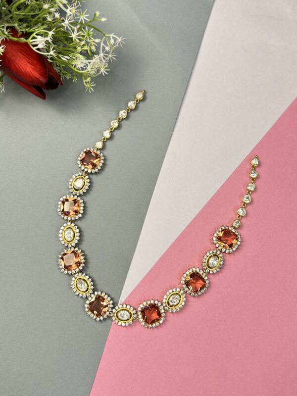 The image showcases a beautiful necklace. It appears to be a statement piece with a modern design.