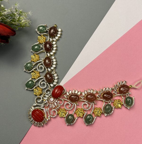 The image showcases a necklace with a bold and elegant design. It features a mix of colors and textures, making it a striking piece of jewelry. "Multi-Color Moissanite Necklace"