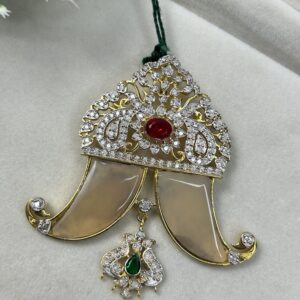 The image shows a close-up of a pendant necklace.