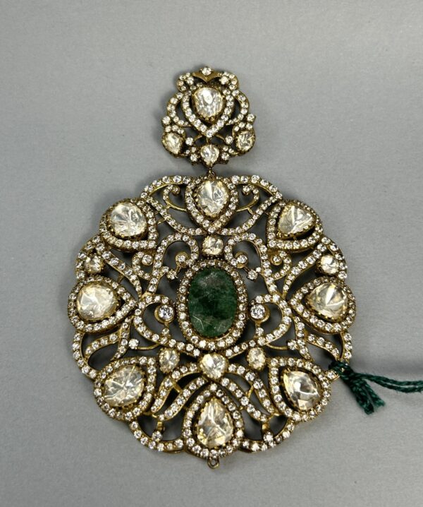 The image appears to be a close-up of a jewelry piece, most likely a necklace or a pendant.