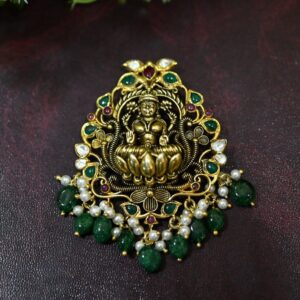 The image showcases a captivating temple pendant. Worn as a necklace pendant for special occasions or everyday wear.