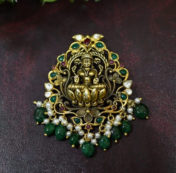 The image showcases a captivating temple pendant. Worn as a necklace pendant for special occasions or everyday wear.