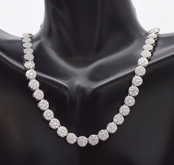 The image showcases a striking 925 sterling silver hip-hop necklace, featuring a bold, polished link design. The links are thick and closely set, creating a heavy, luxurious appearance that captures and reflects light. The craftsmanship emphasizes both durability and high-end style, perfect for making a confident streetwear statement for both men and women.